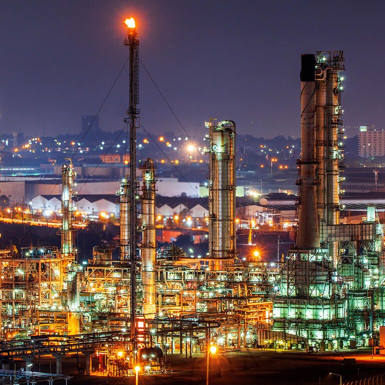 Oil refinery and​ industrial​ city​ After sunset