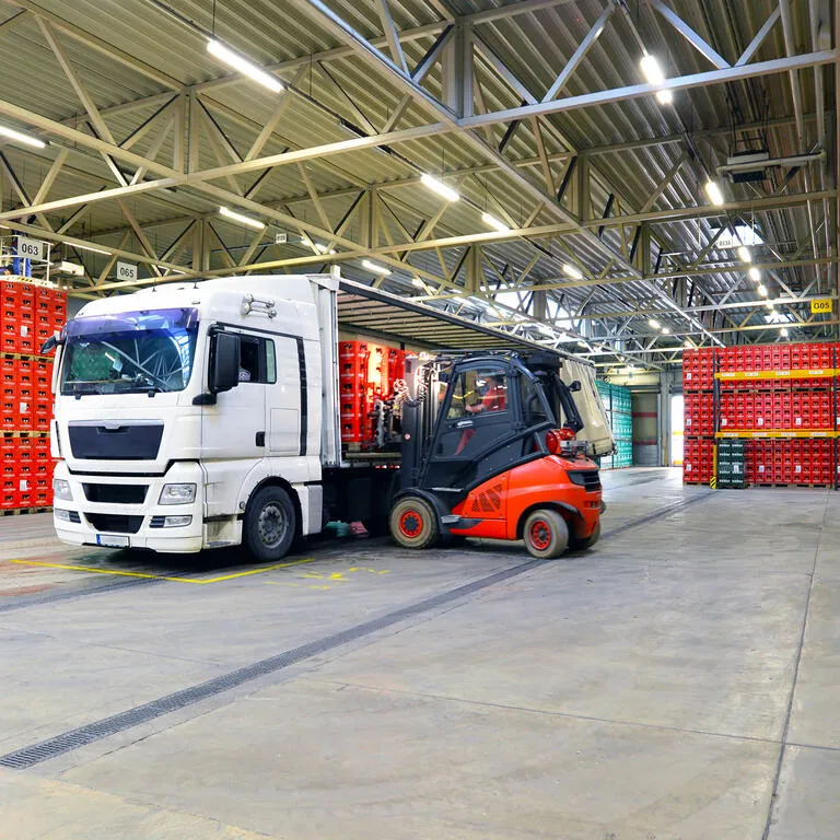 shipping - loading of a truck in a warehouse by forklift